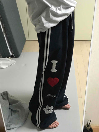 Kitsch Embossed Track Long Pants