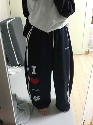 Kitsch Embossed Track Long Pants