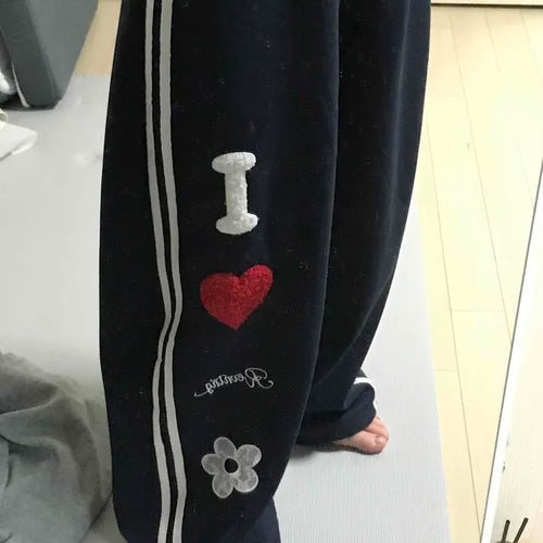 Kitsch Embossed Track Long Pants