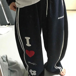 Kitsch Embossed Track Long Pants