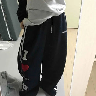 Kitsch Embossed Track Long Pants