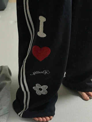 Kitsch Embossed Track Long Pants