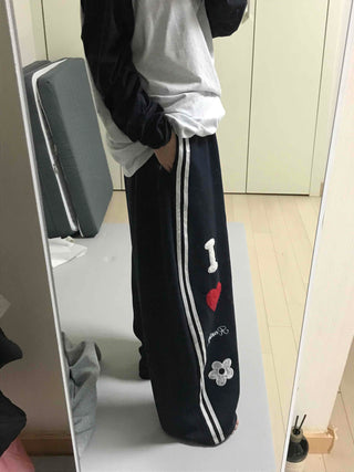 Kitsch Embossed Track Long Pants