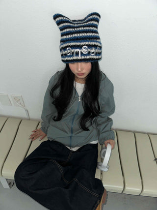 Fleece-lined hidden hood oversized zip-up windbreaker