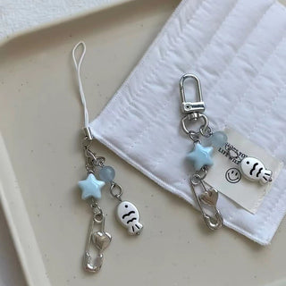 Fish & stars phone charm