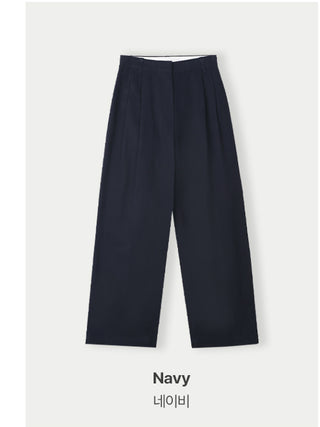 Wide cotton slacks with pleats