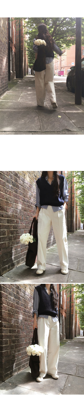 Wide cotton slacks with pleats