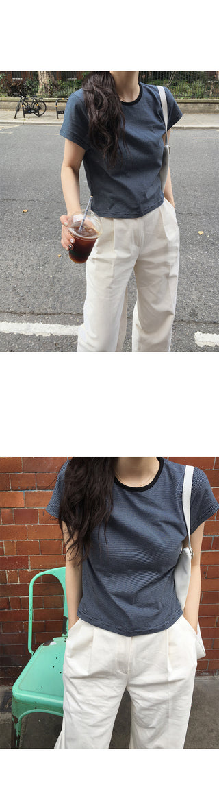 Wide cotton slacks with pleats