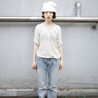 Rolled-up see-through knit