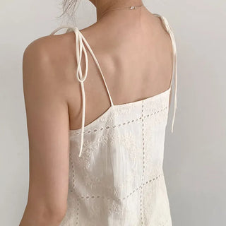 Square embroidered sleeveless blouse