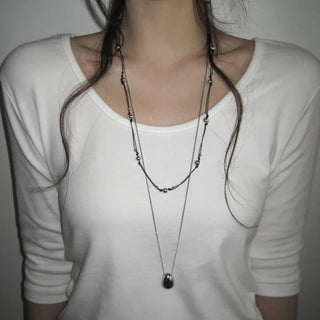 Strap ball long necklace