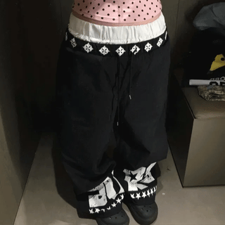 cross lettering pants
