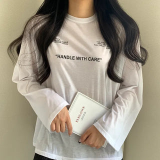 Loose-fit Flowy Lettering English Long-sleeve T-shirt