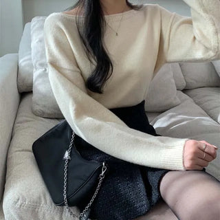 Rotating Boat Neck Asymmetrical Off-Shoulder Knit