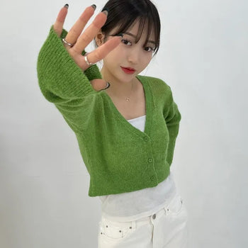 Cropped cardigan layered with cotton bolero