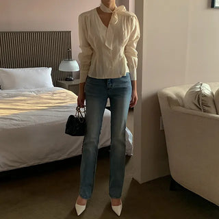Loose semi-bootcut denim pants
