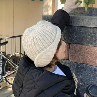 Long knitted earflap beanie