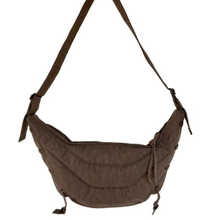 Eyelet crescent crossbody bag