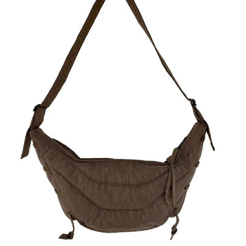 Eyelet crescent crossbody bag