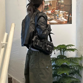 Pocket eyelet shoulder bag