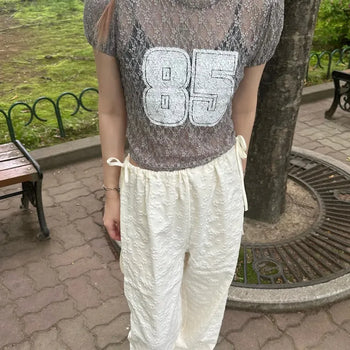 Flower Embossed Waist Drawstring Wide Pants
