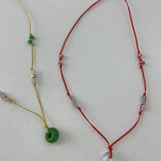 Stopper gemstone string necklace