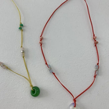 Stopper gemstone string necklace