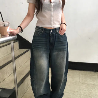 Washed denim with cut-out pocket details