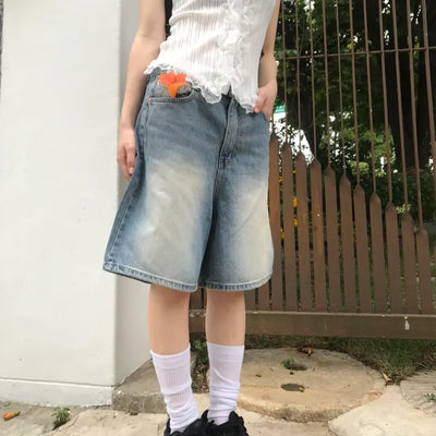 Washed light blue cropped denim pants