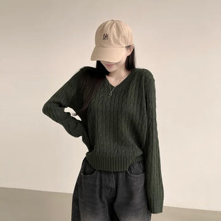 A comfortable loose fit you'll reach for often, daily cable knit V-neck long-sleeve sweater