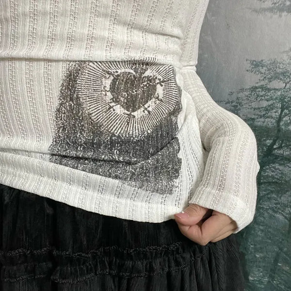 Cupid Punching Off-Shoulder Knit Top