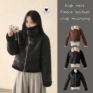 A Suede High-Neck Buckle Sherpa Loose-Fit Leather Shearling Short Jacket that keeps you warm all the way up to your neck and protects you from the cold