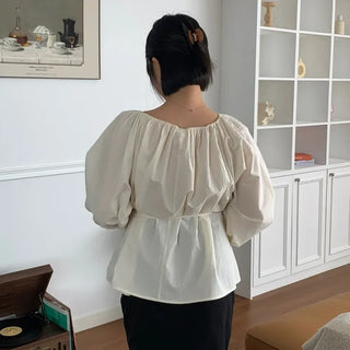 Plain blouse with shirring layered