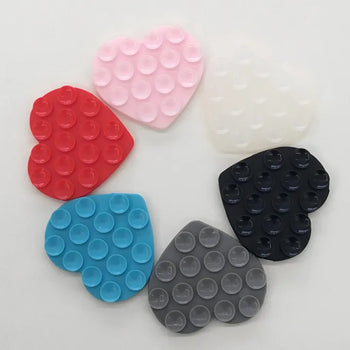 Heart-shaped suction pads
