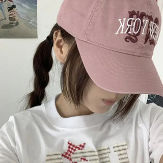 Wear New York ball cap