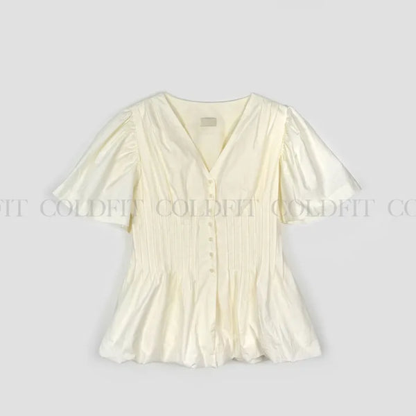 Voluminous pintuck blouse
