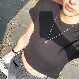 Rolled-up, stretchy mochi short-sleeve t-shirt