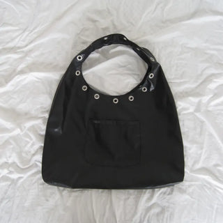 Eyelet soft shoulder bag
