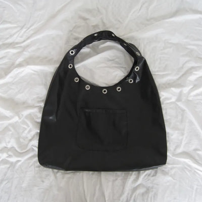 Eyelet soft shoulder bag