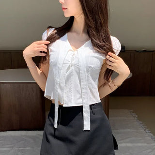 Tira Tie Punching Crop Blouse