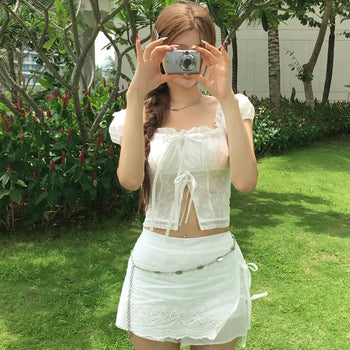 Minute Ribbon Lace Punching Puff Blouse