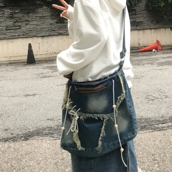 Vintage denim fringe eyelet strap crossbody bag
