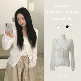 Comfortable, non-clingy seersucker wavy ruffle cropped sleeveless top + slim-fit long-sleeve cardigan layered two-piece set