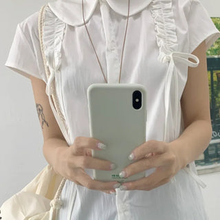 Saki frill ribbon blouse