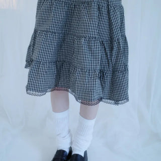 Ruco check midi skirt