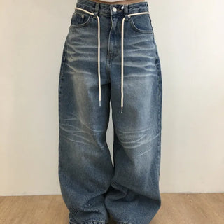 Laser-washed drawstring wide denim pants