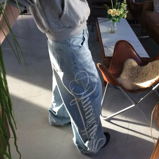 side lettering denim pants