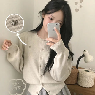 Soft, Round Wool Pendant Avant Loose Fit Long Sleeve Knit Cardigan