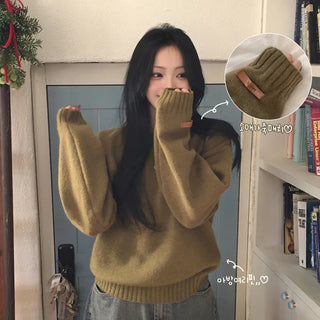 A knit essential, daily plain round neck leather label sleeves delicate avant-garde loose fit long sleeve knit