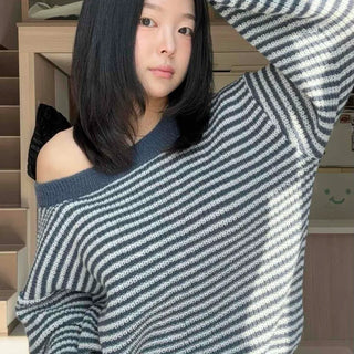 Delicate fit wide slash neck oversized striped knit